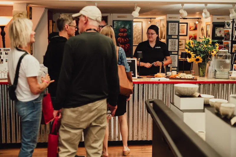 Attendees gathered inside a local Camas business during the Art and Wine Walk.